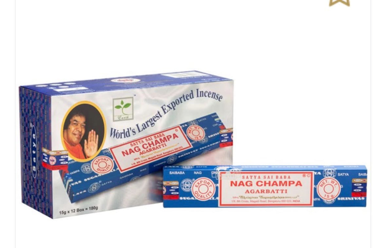 A box and individual stick pack of Navta Gaurav Nag Champa Agarbatti incense sticks on a plain white background.